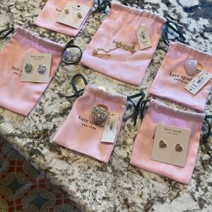 Set of 6 pieces gorgeous Kate Spade Jewelry Set with Pink Pouches. Retail $489.